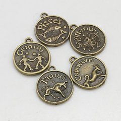Кулони металеві, кольор бронзи, у вигляді монет зі знаками Зодіаку, d=17 mm