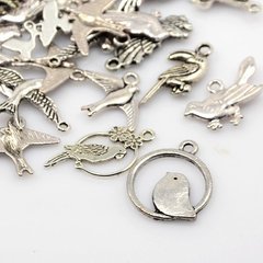 Кулони металеві, сріблясті, пташки, різних форм та розмірів